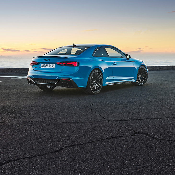 Three-quarter rear view of the Audi RS 5 Coupe.