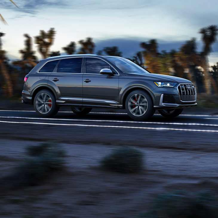 Side profile of the Audi SQ7 accelerating.