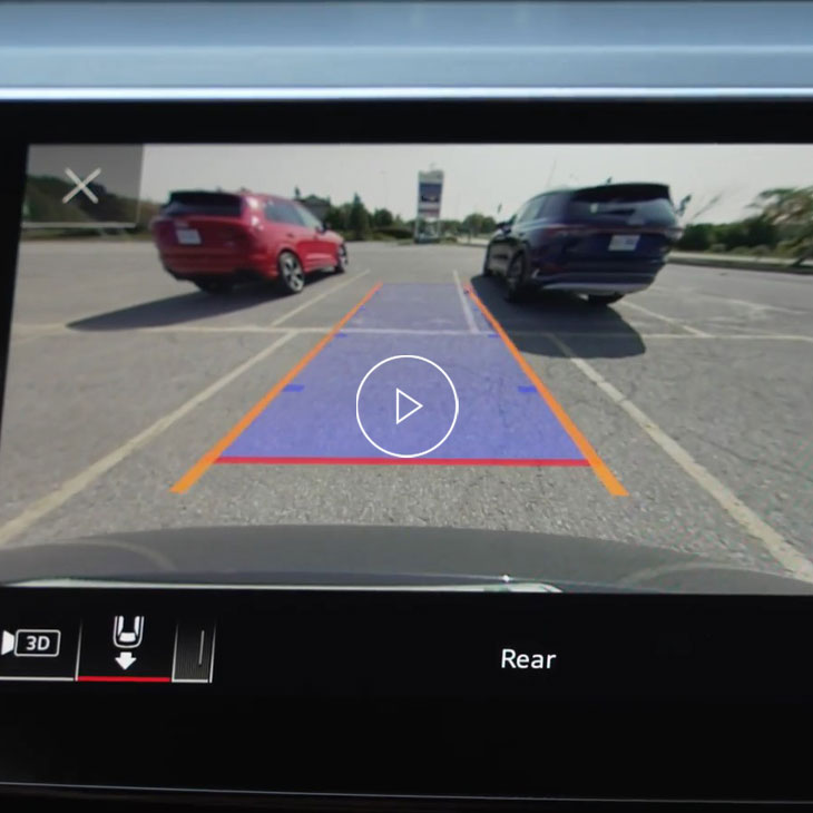 Close-up of the Audi MMI displaying the rearview camera. 