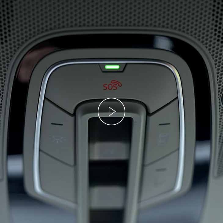  Close-up photo of the Emergency call button inside an Audi vehicle.