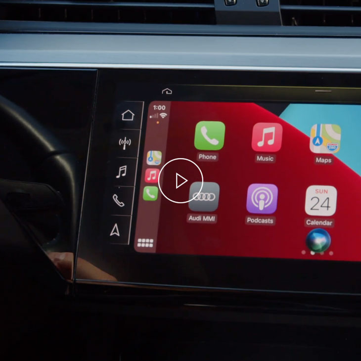 Close-up photo of the Apple CarPlay screen on the Audi MMI display inside an Audi vehicle. 