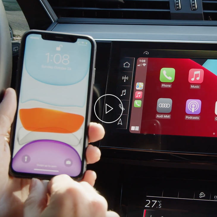 Close-up photo of the Apple CarPlay screen on the Audi MMI display inside an Audi vehicle. 