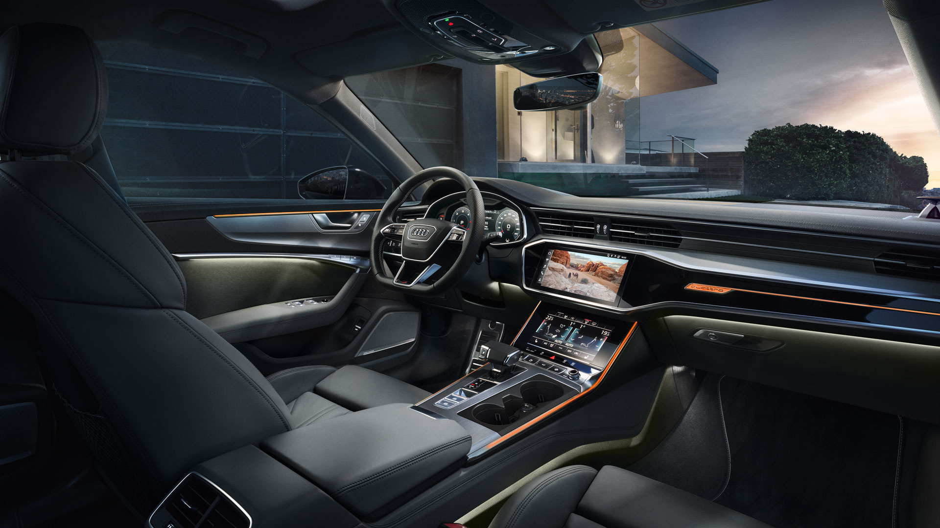 Thème d’éclairage intérieur de l’interface multimédia Audi qui ressemble à un désert montré dans un véhicule Audi.