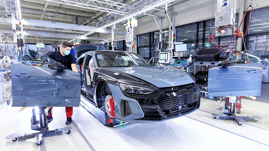 An Audi vehicle being assembled. 