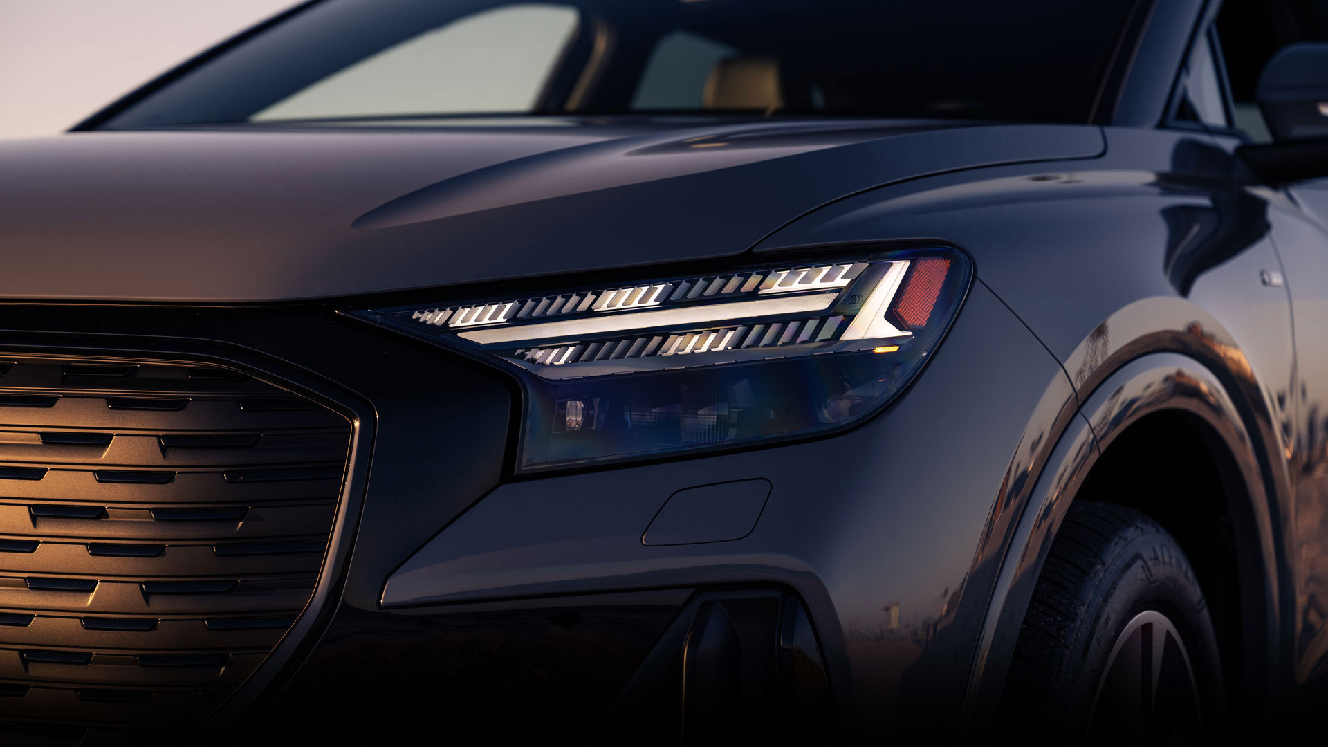 Close-up of the LED daytime running lights on an Audi Q8 e-tron. 