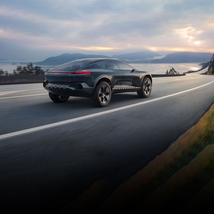 Three-quarter rear view of the activesphere concept vehicle accelerating. 