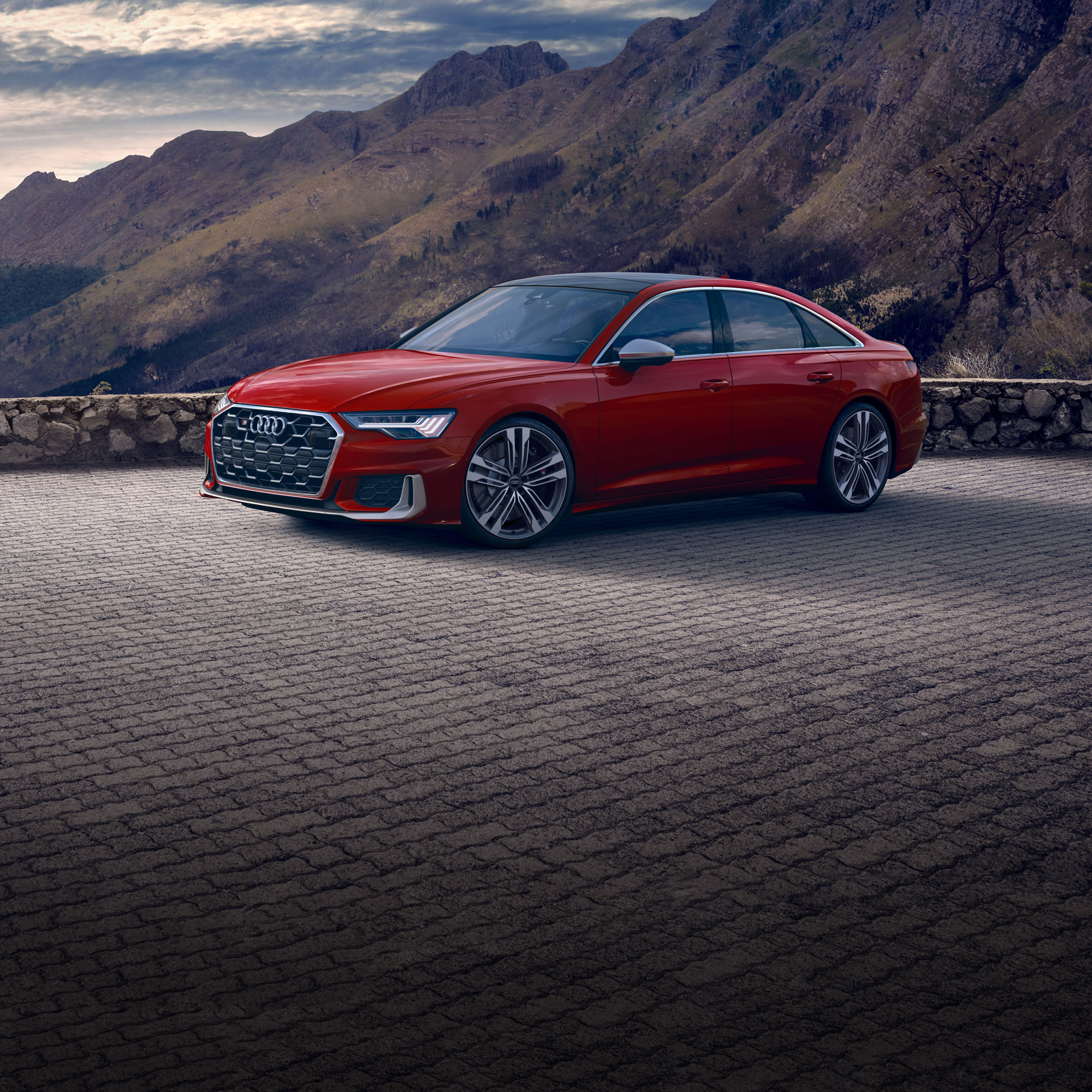 Three-quarter front view of the Audi S6 Sedan parked.